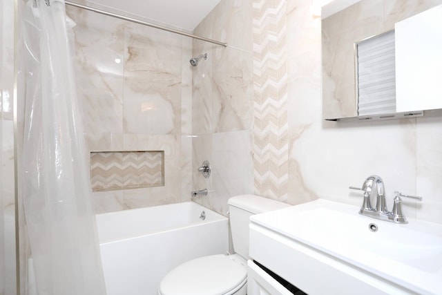 full bathroom featuring vanity, shower / bath combo with shower curtain, and toilet