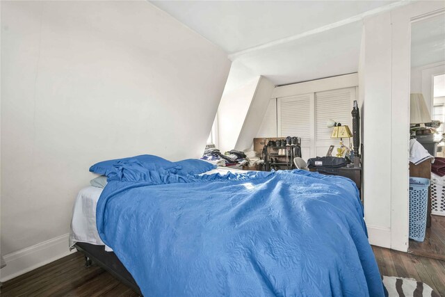 bedroom featuring dark hardwood / wood-style floors