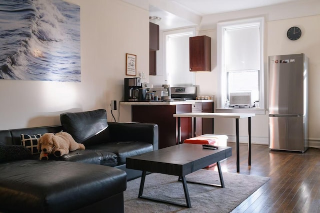 living room featuring dark hardwood / wood-style flooring