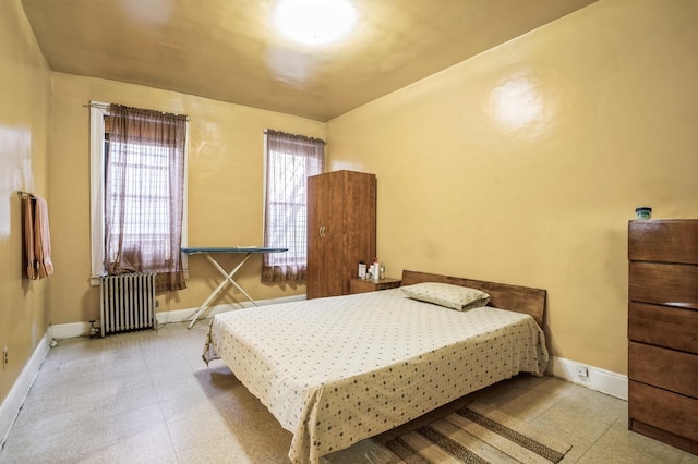 bedroom with radiator heating unit