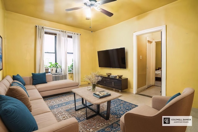 living room with a ceiling fan