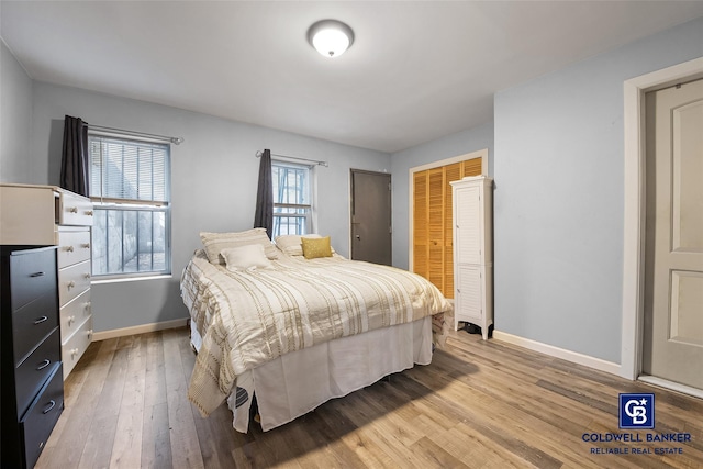 bedroom with light hardwood / wood-style floors