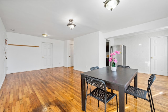 dining area featuring light hardwood / wood-style flooring