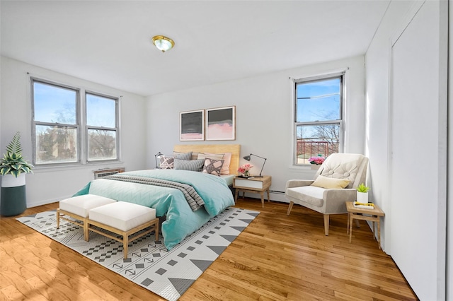 bedroom featuring wood-type flooring