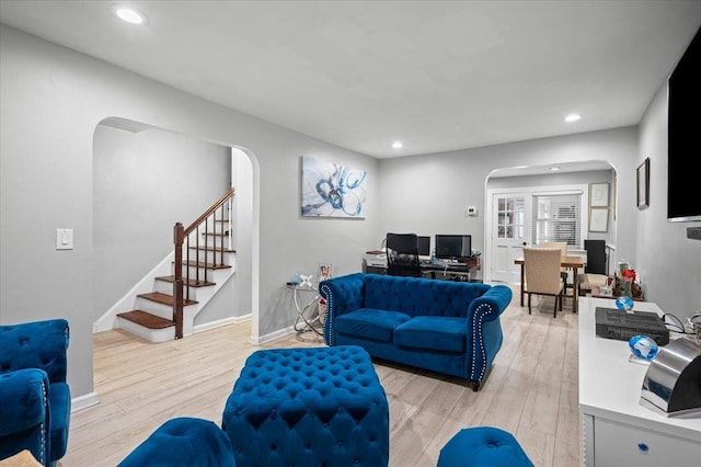 living room with light hardwood / wood-style floors