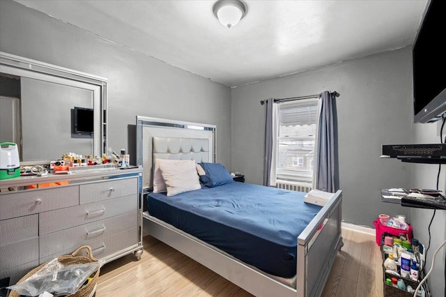 bedroom featuring light hardwood / wood-style floors