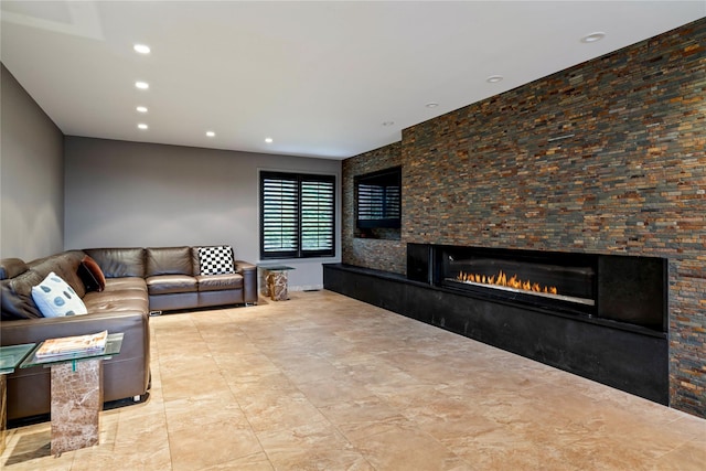 living room featuring a fireplace