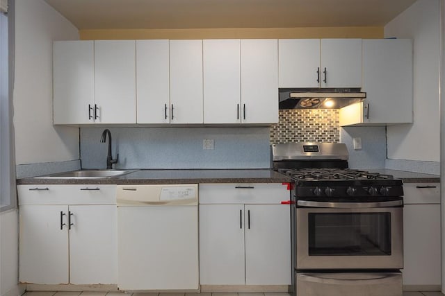 kitchen with dishwasher, white cabinets, sink, gas range, and decorative backsplash