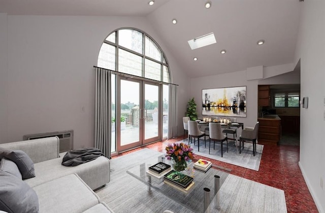 living room featuring a skylight, high vaulted ceiling, and an AC wall unit