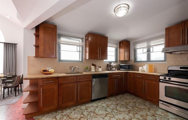 kitchen featuring decorative backsplash, sink, plenty of natural light, and appliances with stainless steel finishes