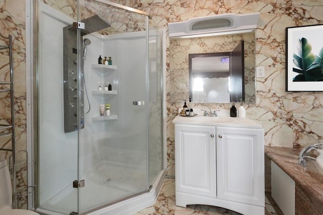 bathroom with vanity and an enclosed shower