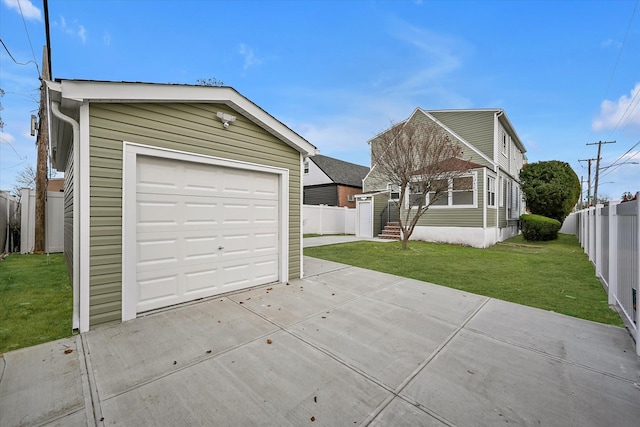 garage featuring a yard