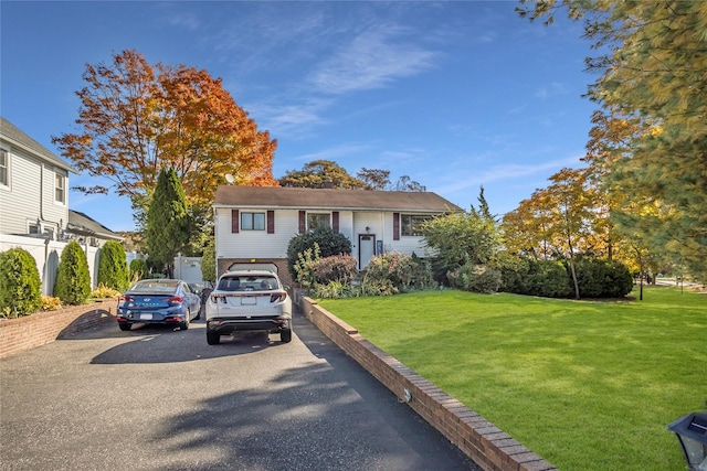 view of front of property with a front lawn