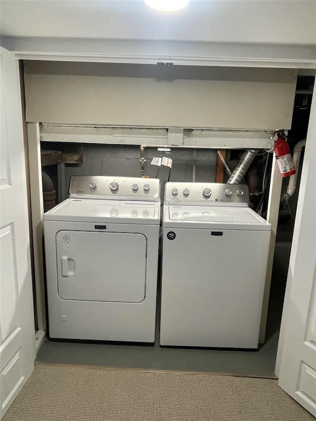 laundry room featuring washing machine and dryer