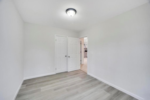 unfurnished room featuring light hardwood / wood-style flooring