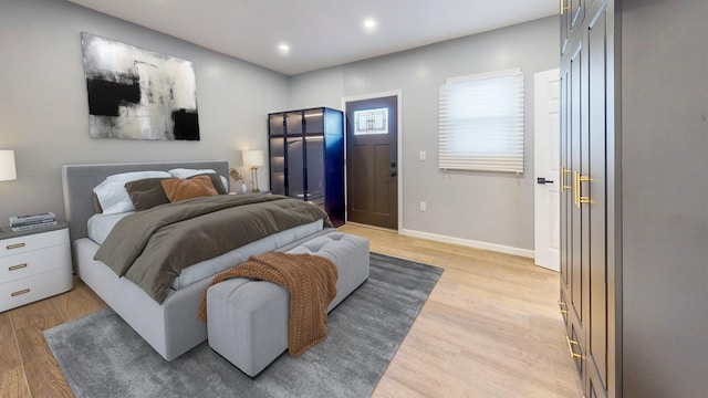 bedroom featuring light wood-type flooring