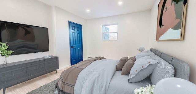 bedroom with light wood-type flooring