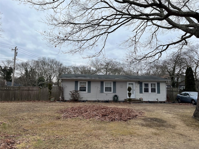 view of front of property with a front lawn