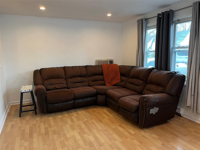 16 Sagewood Dr, Shirley, NY 11967 - living area featuring light wood-type flooring, recessed lighting, crown molding, and baseboards