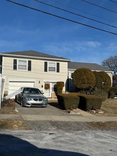 view of front of property featuring a garage