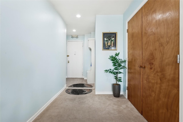 hallway with light carpet