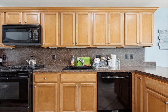 kitchen with sink, decorative backsplash, and black appliances