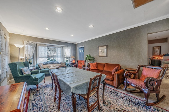 dining area featuring crown molding