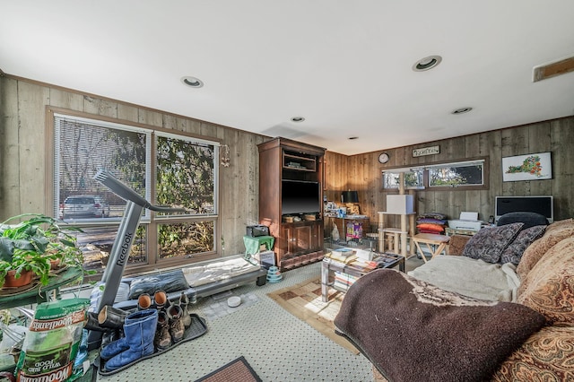 living room with wooden walls