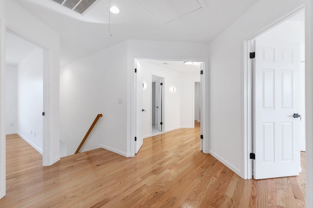 corridor featuring light hardwood / wood-style flooring