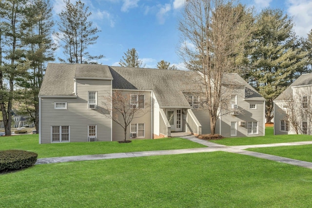 view of front of house with a front lawn