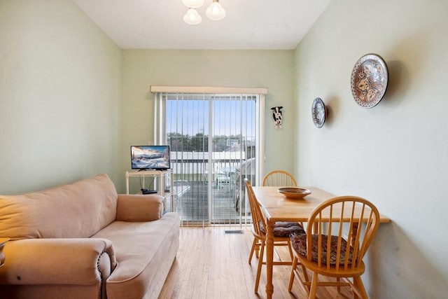 dining space featuring hardwood / wood-style floors