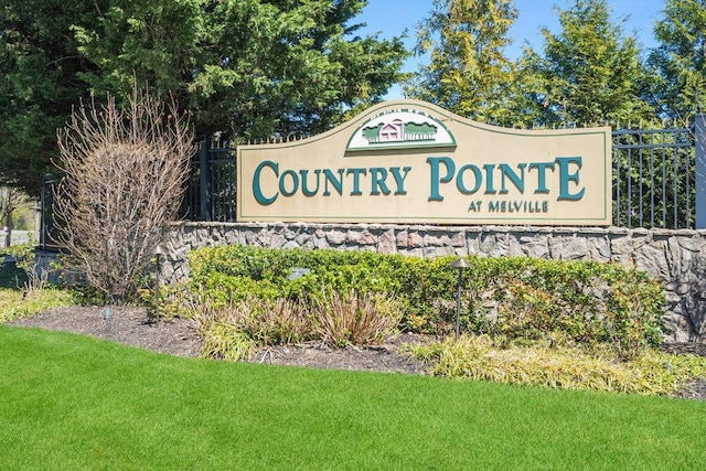 view of community sign