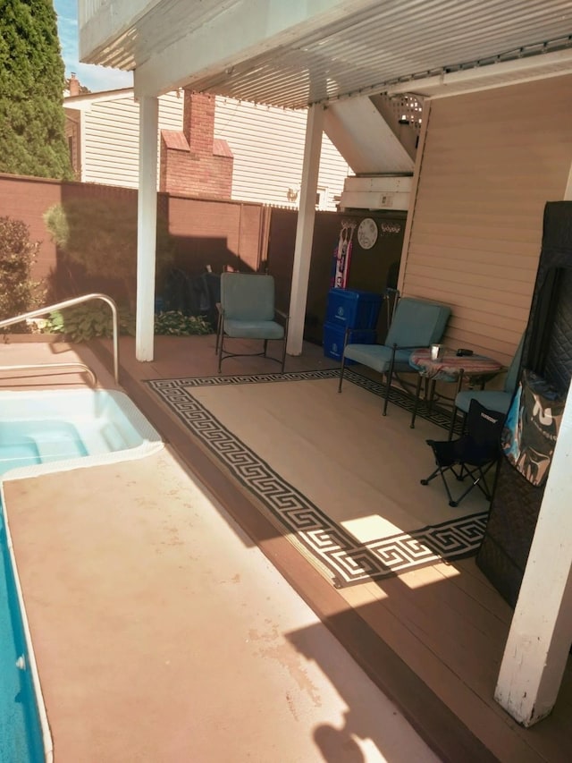 view of patio / terrace with a pool