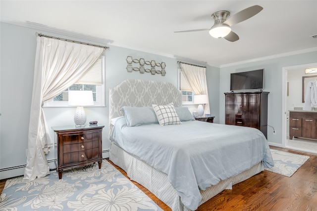 bedroom with ceiling fan, ensuite bathroom, light hardwood / wood-style flooring, ornamental molding, and a baseboard radiator