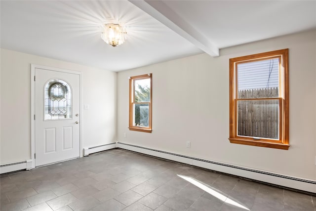 foyer with baseboard heating and beam ceiling