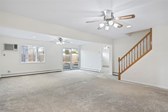 unfurnished living room featuring a baseboard heating unit, carpet floors, a wall mounted AC, and ceiling fan