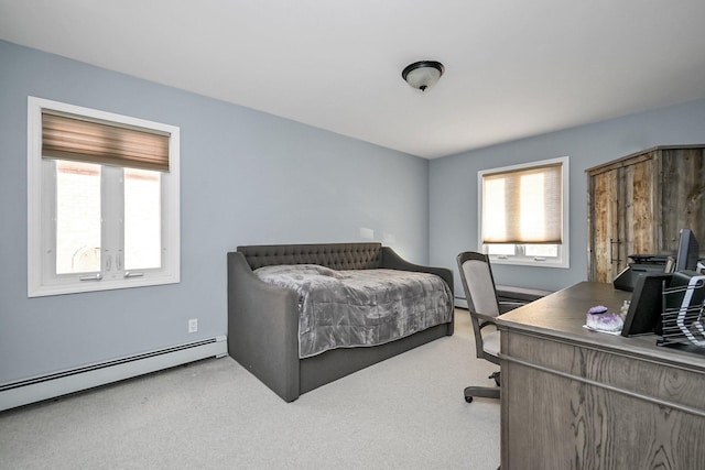 bedroom with a baseboard heating unit