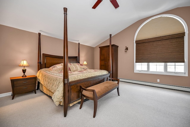 carpeted bedroom with ceiling fan, a baseboard heating unit, and lofted ceiling