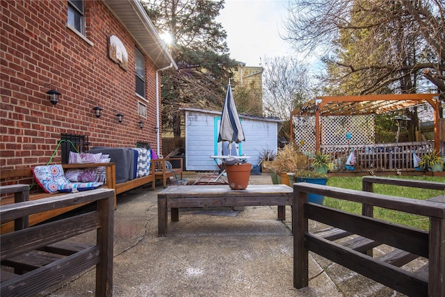 view of patio featuring an outdoor hangout area, a pergola, and a shed