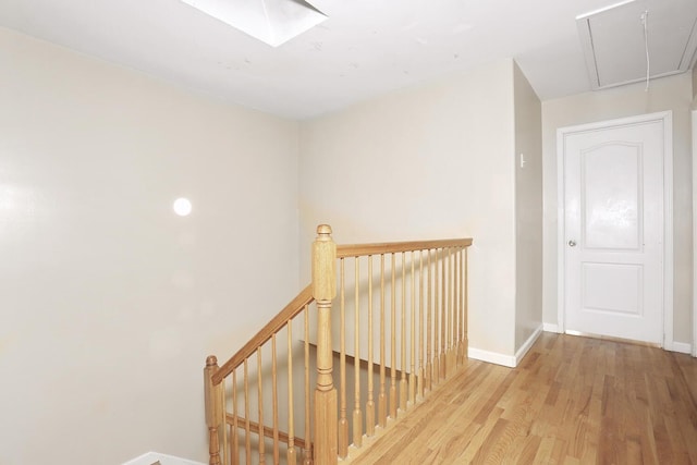 corridor featuring light hardwood / wood-style floors