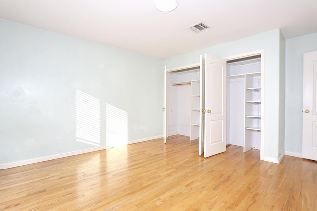 unfurnished bedroom featuring light hardwood / wood-style flooring