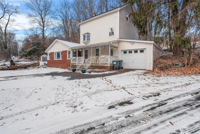 view of front of house featuring a garage and a porch