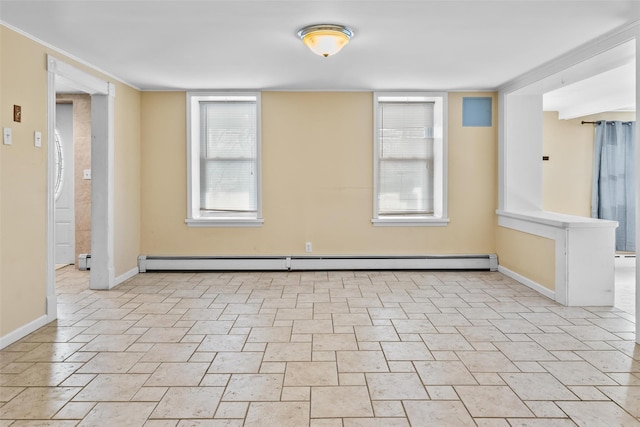 spare room with a baseboard heating unit