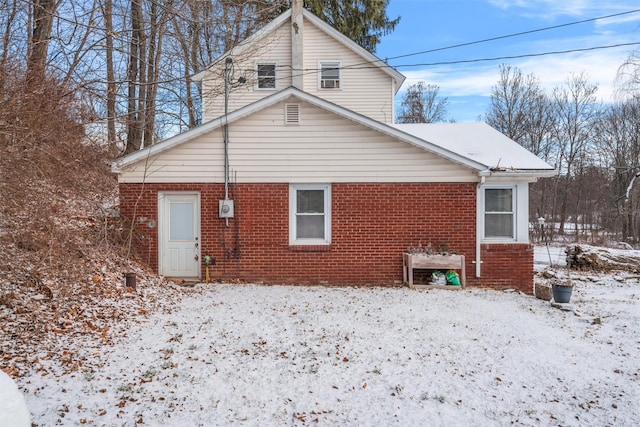 view of snow covered property