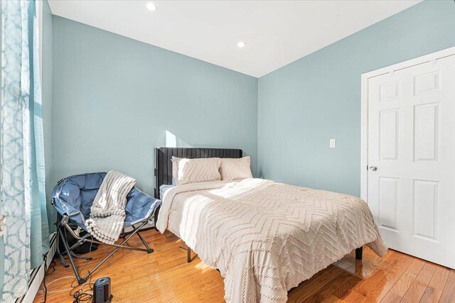 bedroom featuring hardwood / wood-style flooring