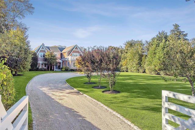 view of community featuring a lawn