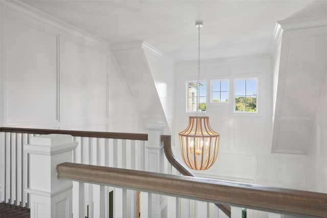 room details with crown molding and a notable chandelier