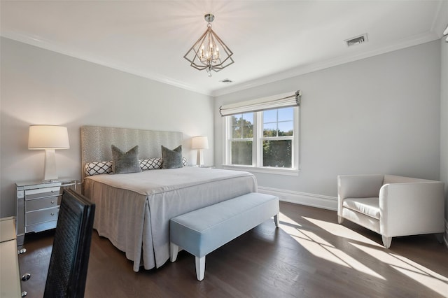 bedroom with crown molding, dark wood-type flooring, and an inviting chandelier