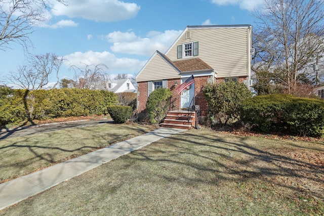 view of front of home with a front lawn