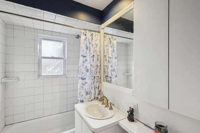 bathroom with vanity and shower / bathtub combination with curtain